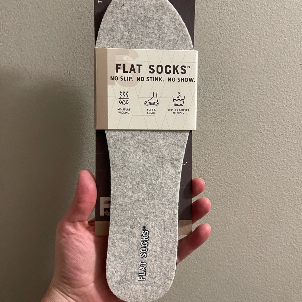 Flat socks, no slip, no show, new in package.